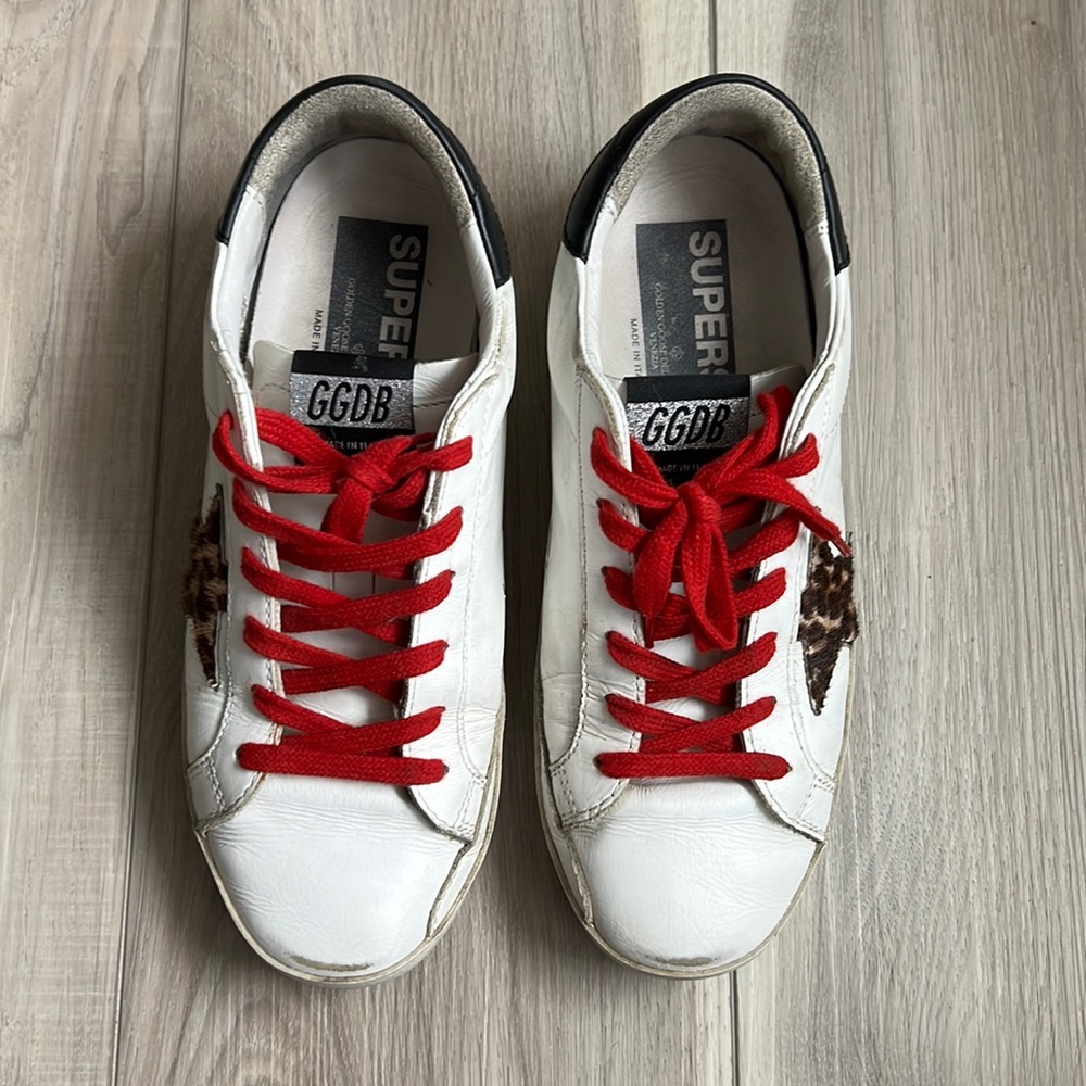 Authentic pre-loved Golden Goose sneakers size 7 Red laces w/Leopard star